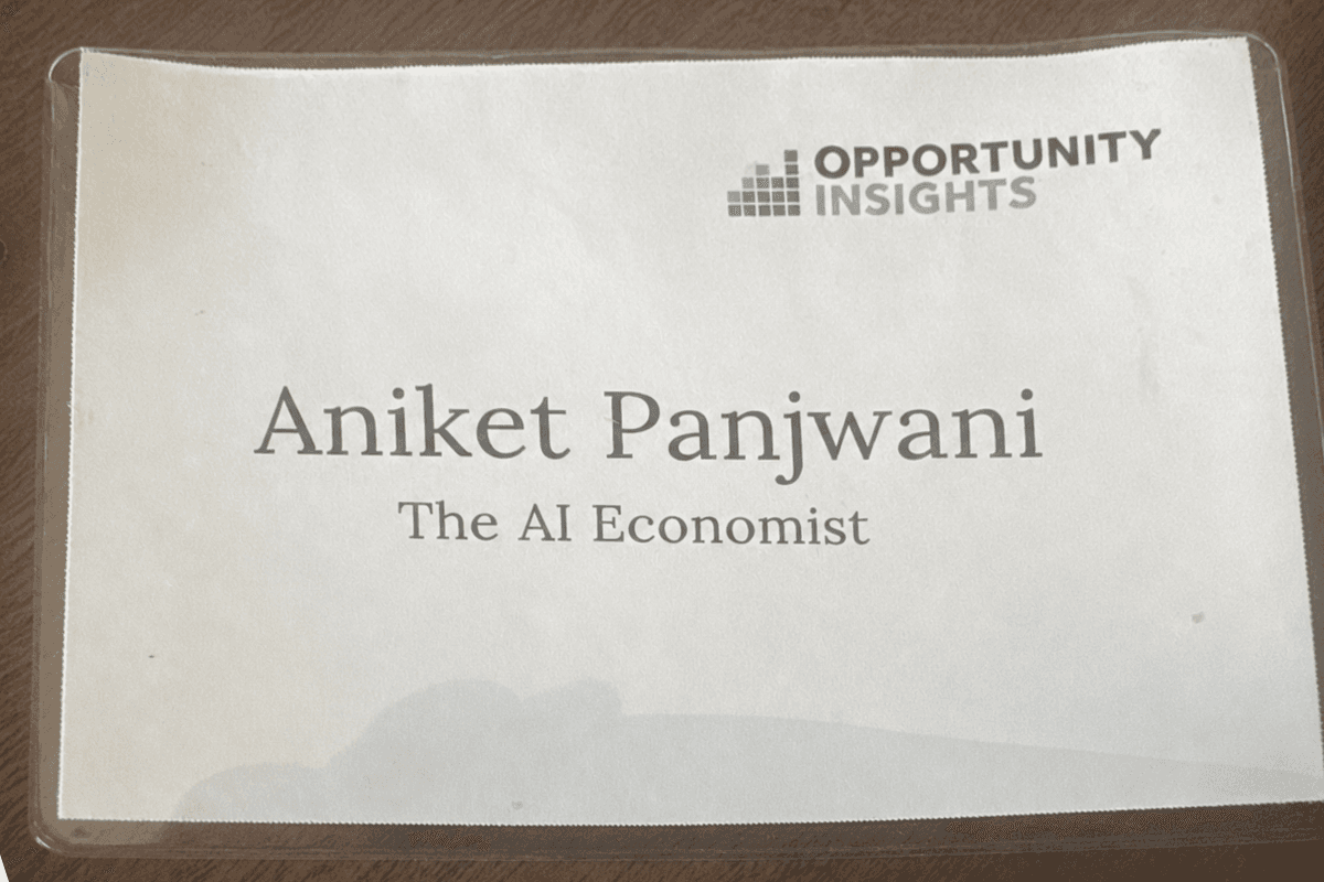 Aniket Panjwani's Opportunity Insights name badge from the workshop